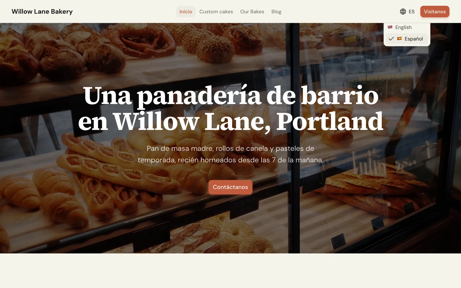 The live site in Spanish with the language switcher open